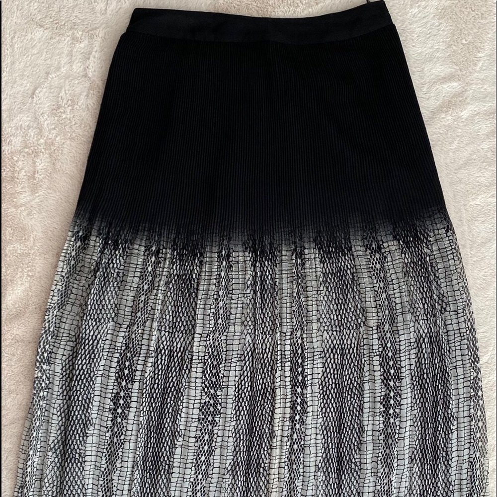 Ecoté midi skirt. (Urban Outfitters)
